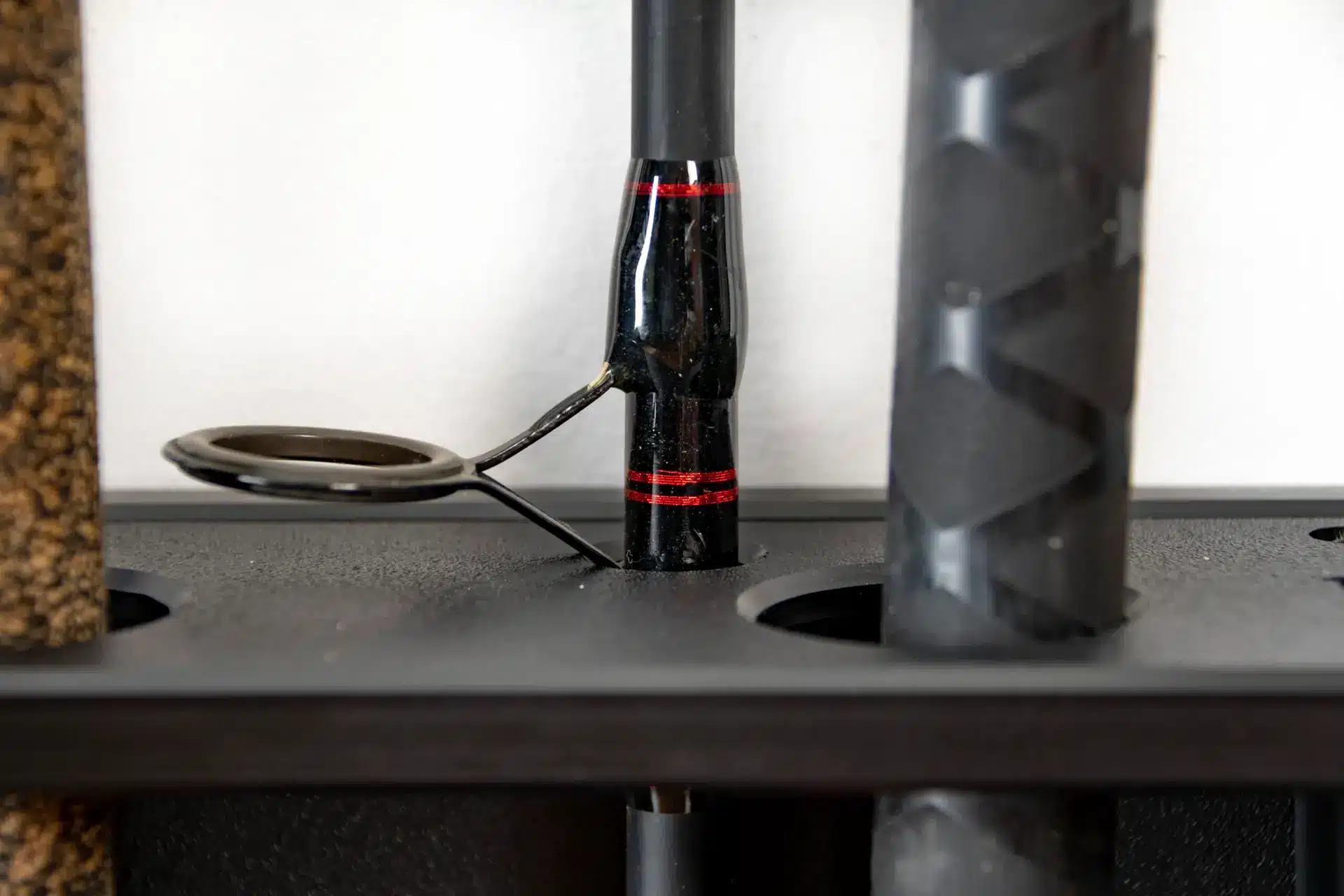 MWS Fishing Rack fishing gear wall organization mounts holding rods vertically