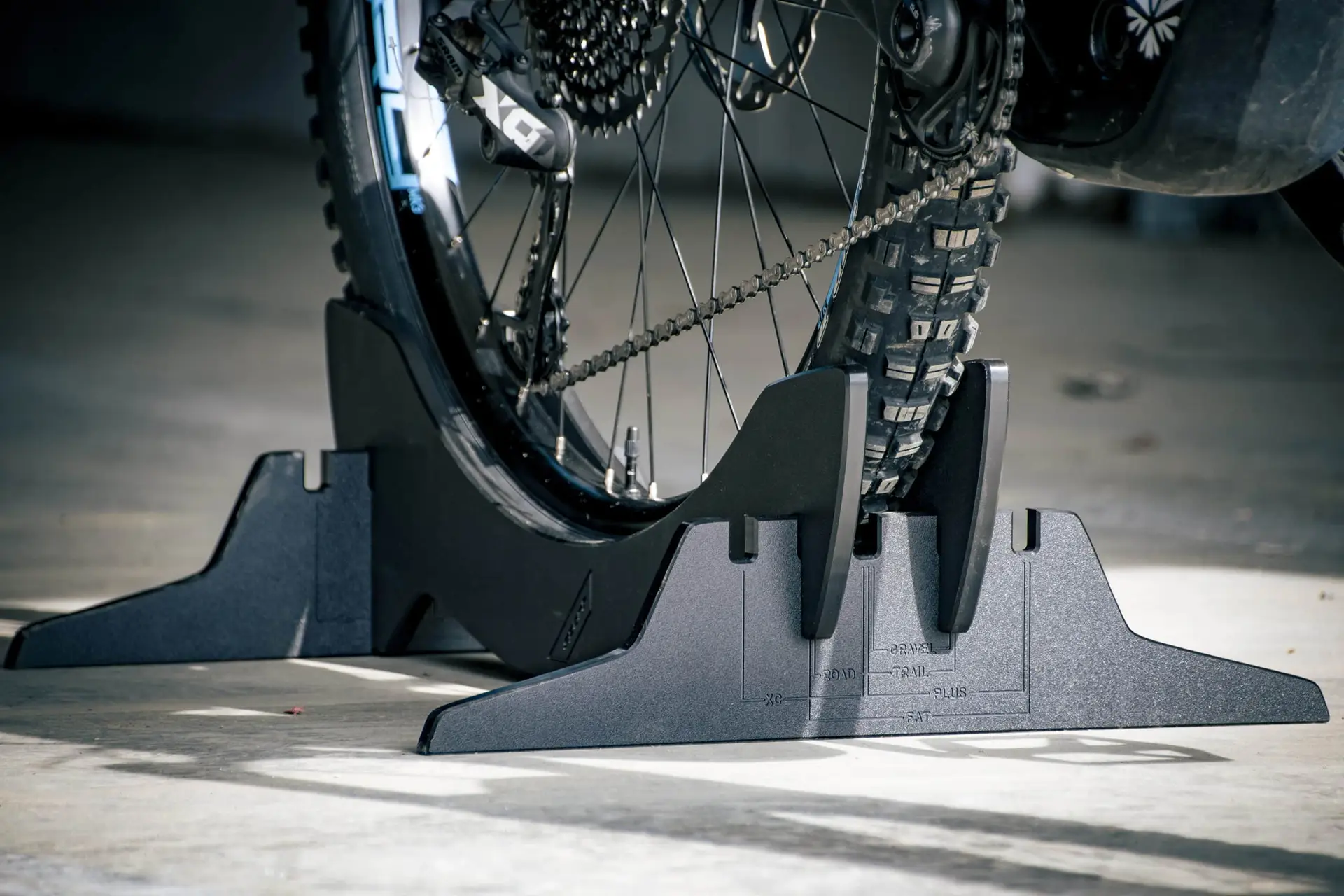 Bike storage rack for garage stabilizing a road bike