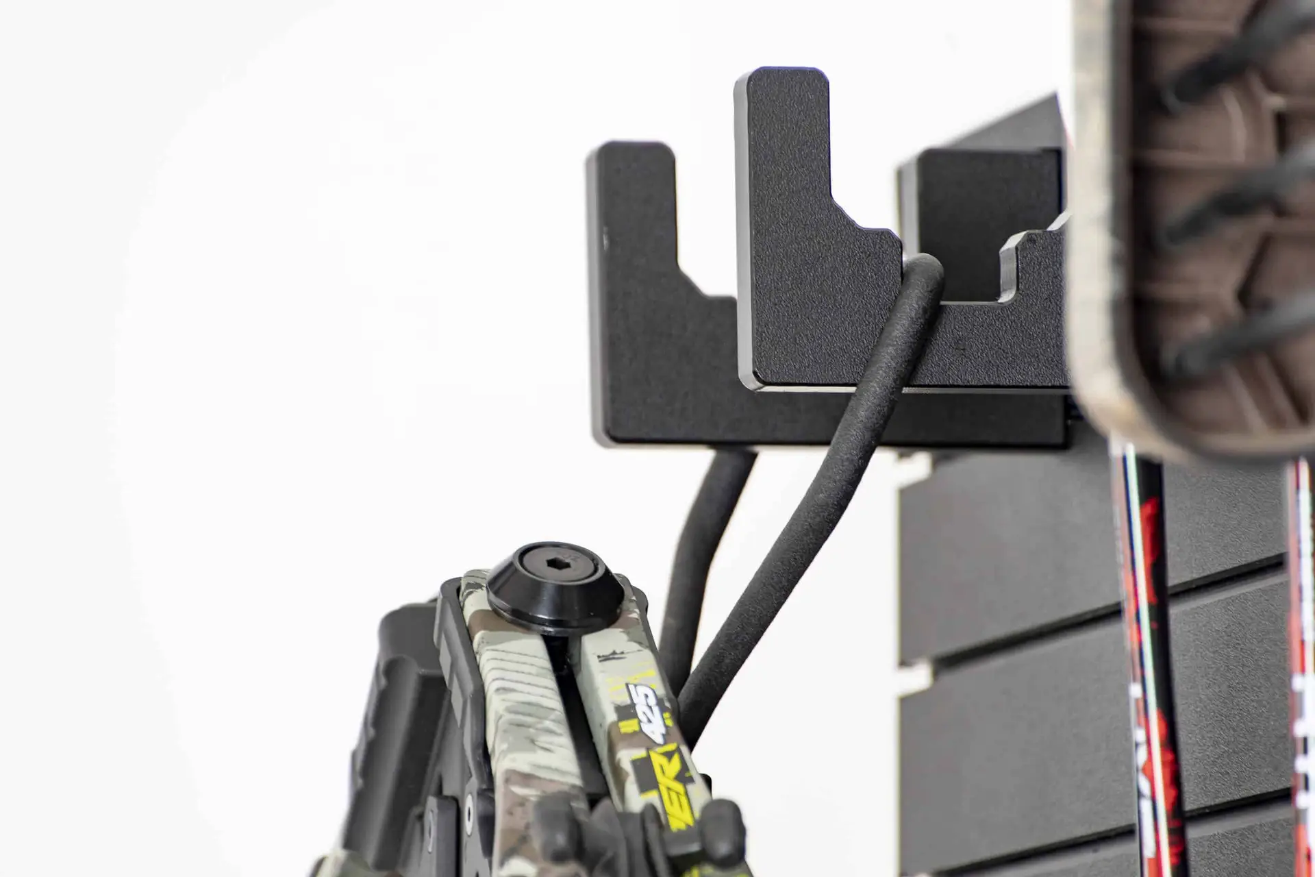 ModWall Archery Pack Strap block securing bow limbs against the panel