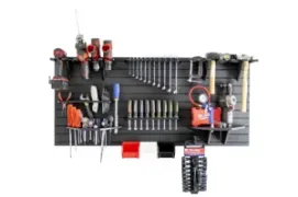 Complete modular tool wall organizer displaying power drills, combination wrenches, screwdrivers, air tools, hammers, pliers, storage bins, and shelves on a black HDPE panel against a white background.