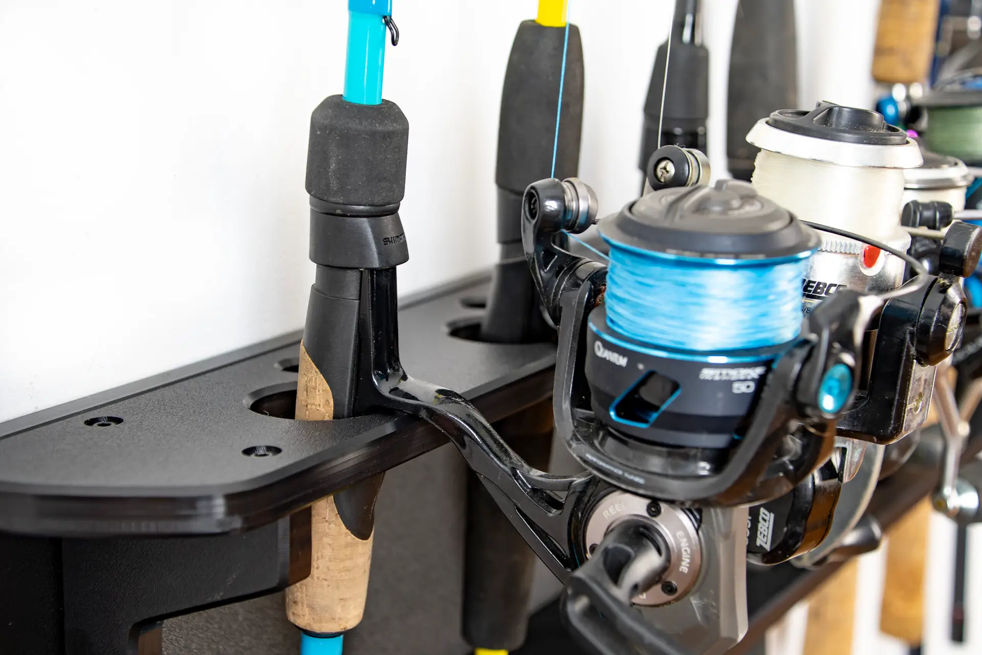 MWS Fishing Rack fishing gear wall organization mounts holding rods vertically