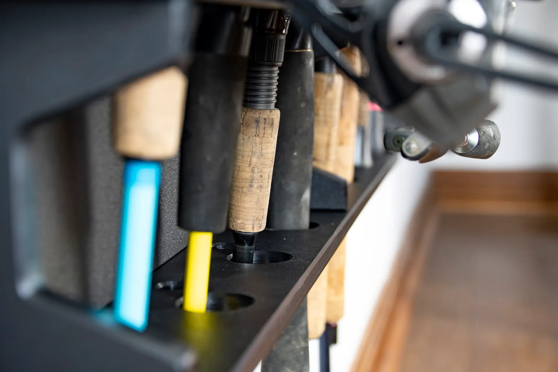 MWS Fishing Rack fishing gear wall organization mounts holding rods vertically