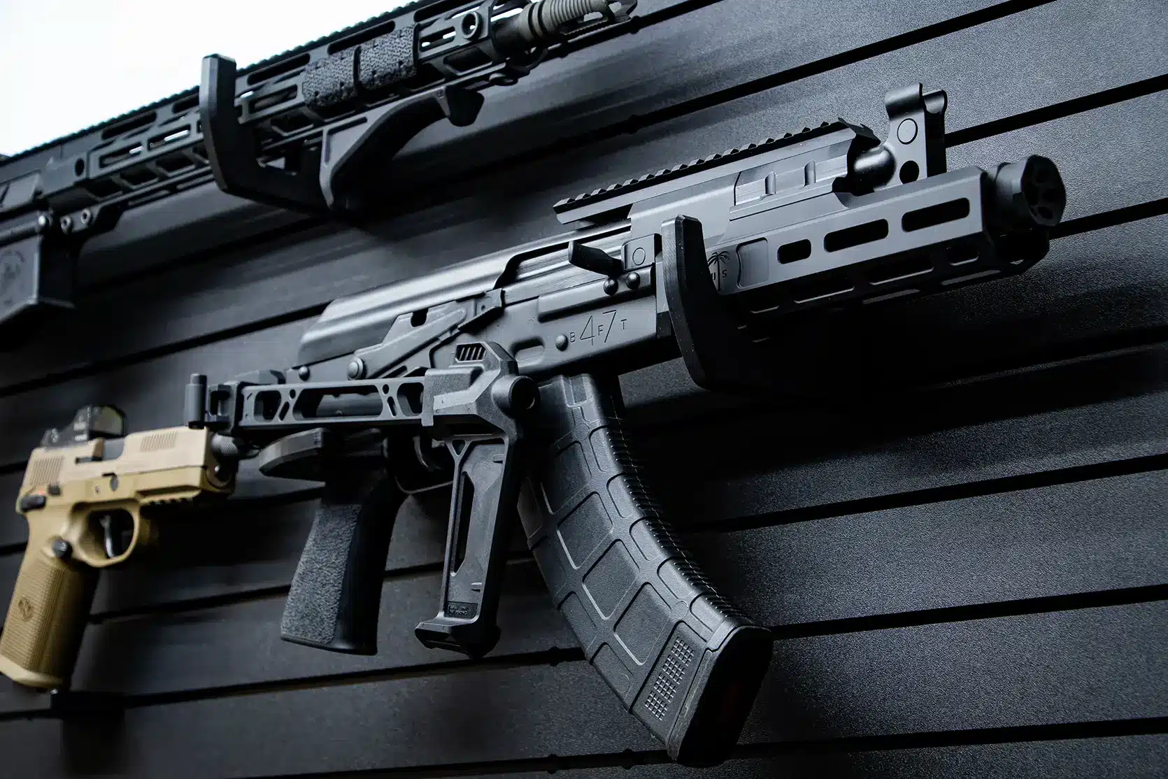 ModWall 9 Gun Combo Pack Detail view of a tactical AR-15 rifle mounted horizontally on a black ModWall panel.