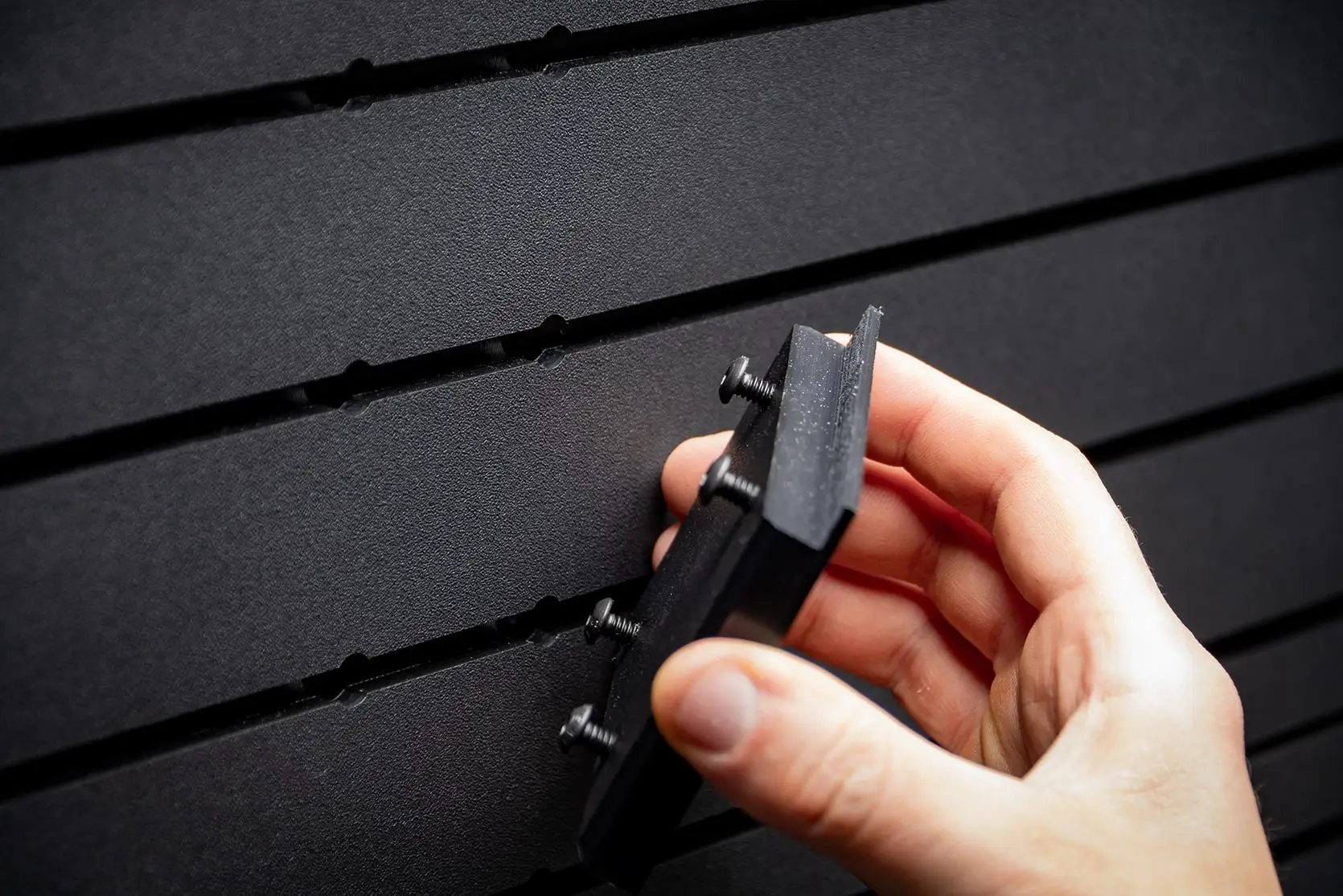 ModWall Panels (48″Wx22″H) An alpha wall mag about to be inserted via the four metal screws and slots.