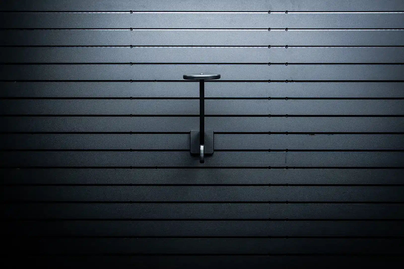 ModWall Helmet Hanger Wall mounted helmet hanger on ModWall panel.