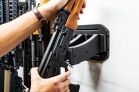ModWall Vertical Rifle Hangers AR-15 and AK-47 locked on the wall
