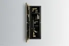 1450 Framed Concealment Mirror A full view of an open, recessed wall mirror revealing a hidden tactical storage compartment filled with rifles, handguns, and ammunition magazines.