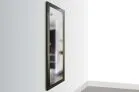 1450 Framed Concealment Mirror A full-length rectangular mirror with a dark, textured wood frame (Espresso variant) mounted vertically on a light gray wall.