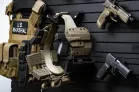 Yellowstone Marshals Gun Wall Package Detailed view of tactical belt and holster mounting on the modular slatwall system by ModWall.