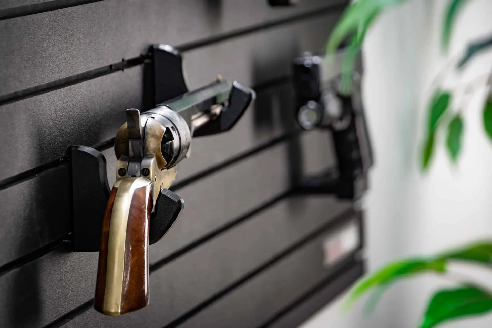 ModWall Handgun Rack Wall mounted handgun rack configured to support a full size revolver against a ModWall gun wall panel.