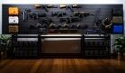 Oversized 4×8 ModWall Panels A wall-spanning, modular gun room setup featuring hand guns, long guns, ammo racks, case adapters, and other tactical accessories.