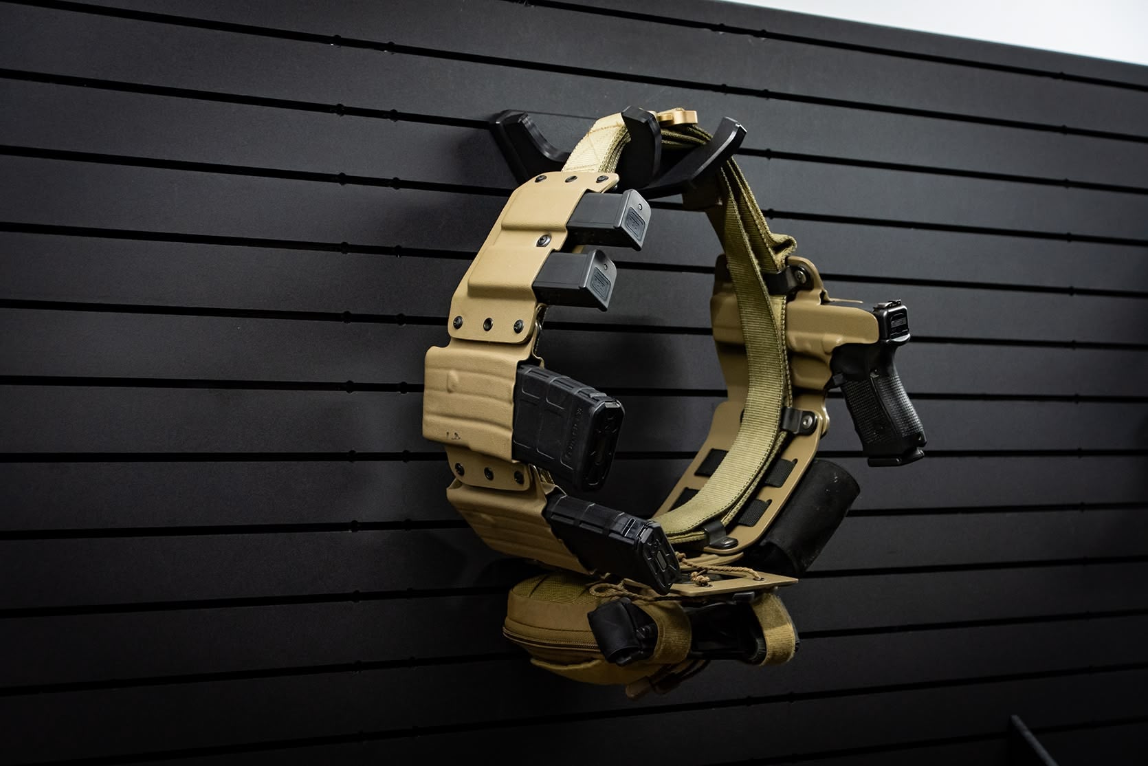 Duty belt holder mounted on a ModWall panel.