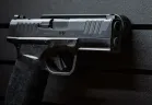 ModWall Hide-A-Mags Magnet accessory mounted on ModWall panel holding a handgun