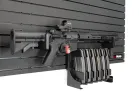 ModWall Magnetic Weapon Lock A rifle secured by a magnetic weapon lock against a ModWall panel, mounted alongside a ModWall mag rack.