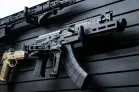 ModWall 9 Gun Combo Pack Detail view of a tactical AR-15 rifle mounted horizontally on a black ModWall panel.