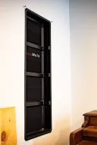 Wall Inserts An angled view of the 1440 variant, showcasing its depth and slim profile along the wall.