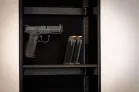 Wall Inserts A handgun and 2 magazines magnetically stored on the velcro backing of the recessed wall insert.