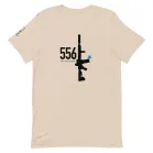 556 Nato Shirt | Day Soft Cream Tactical Walls 556 NATO Day AR-15 shirt with black rifle graphic, blue star accent, and Five Five Six NATO text.