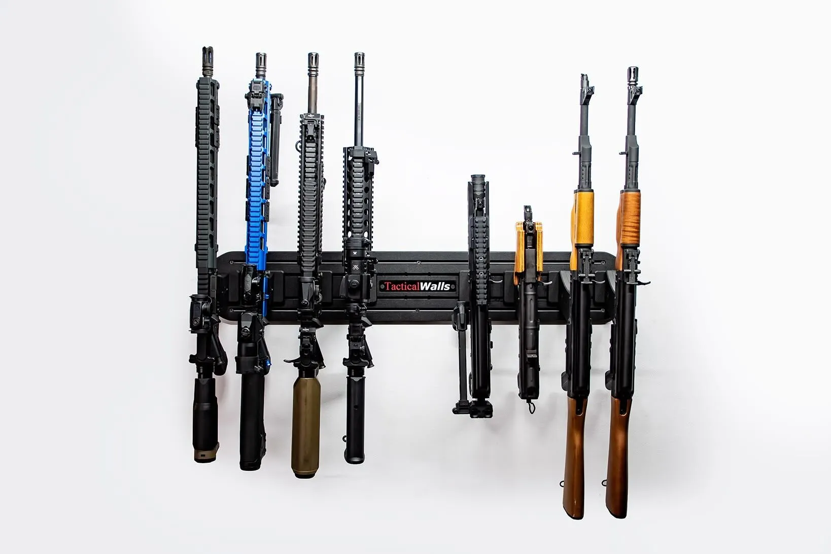 MidMod Panel Vertical rifle storage setup holding rifles by the magwell on a narrow wall panel