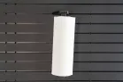 ModWall Towel Rack A wall mount holding a white roll of paper towels against a black panel vertically, showing the mounting flexibility of the accessory,