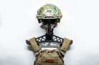 Heavy Gear Hangers A front-view of the skeletonized gear hanger, holding a tactical helmet and plate carrier.