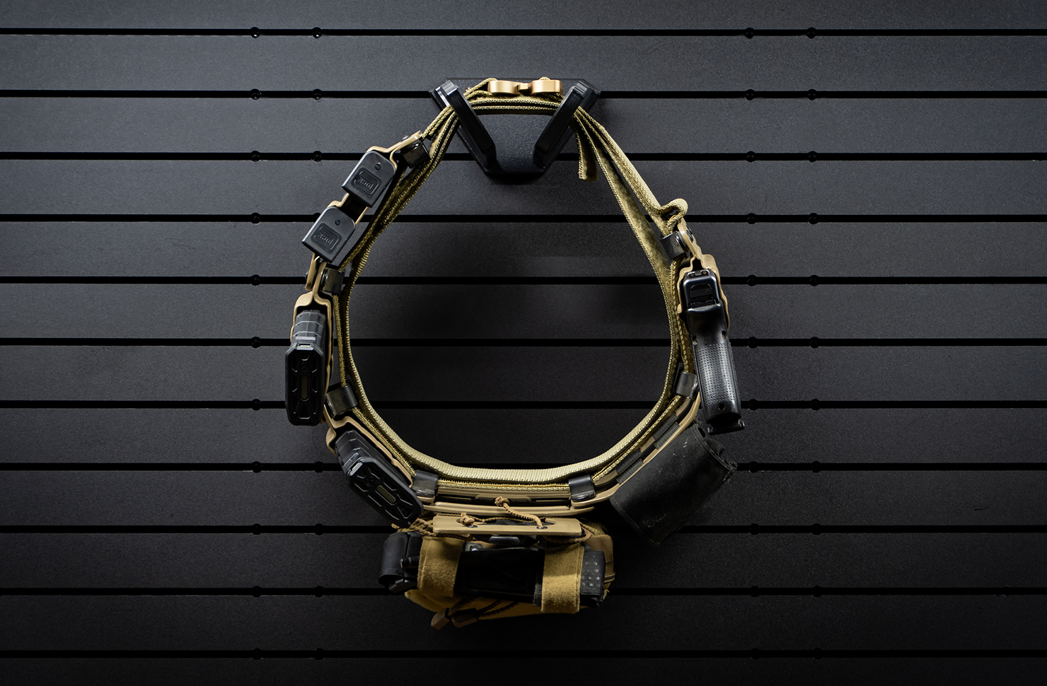 Duty belt holder mounted on a ModWall panel.