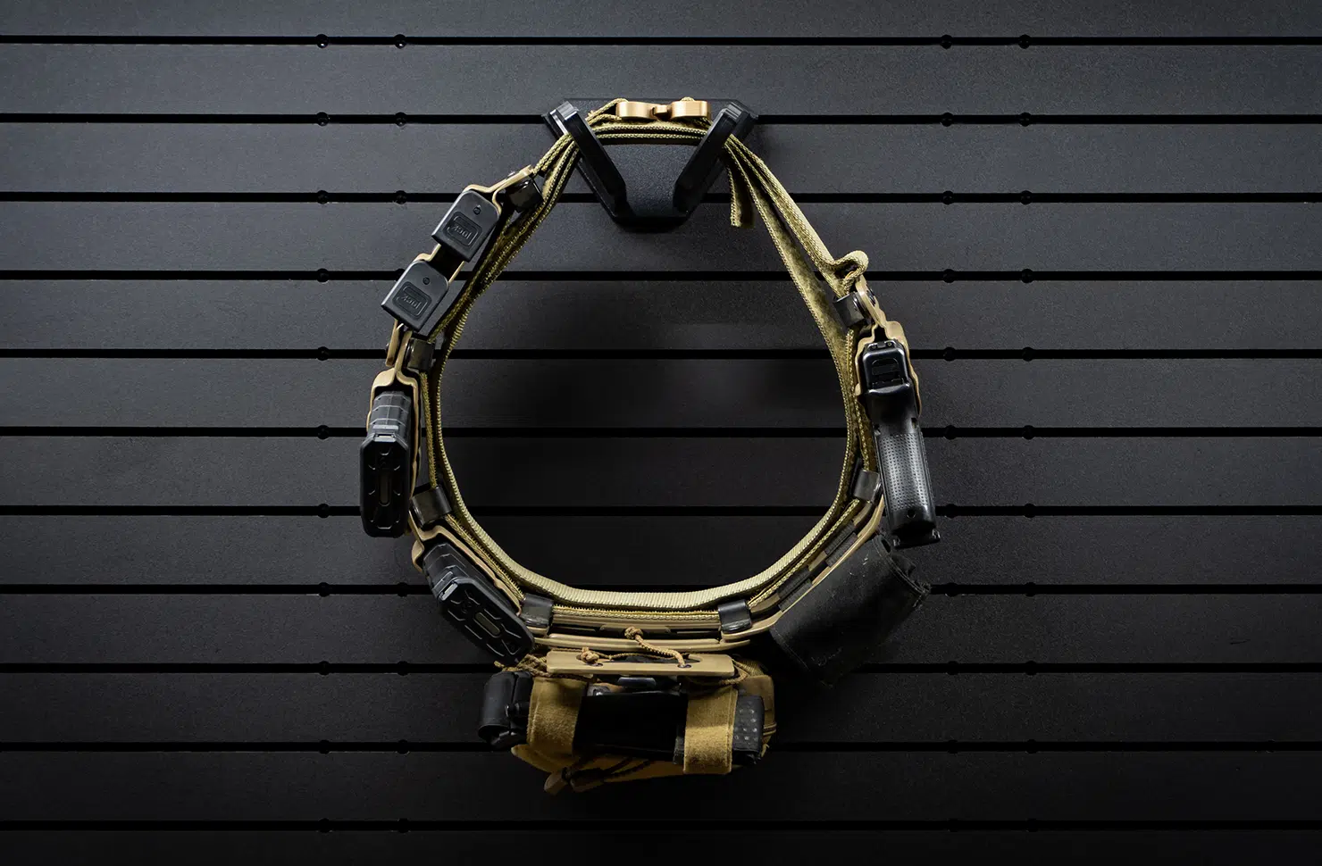Duty belt holder mounted on a ModWall panel.