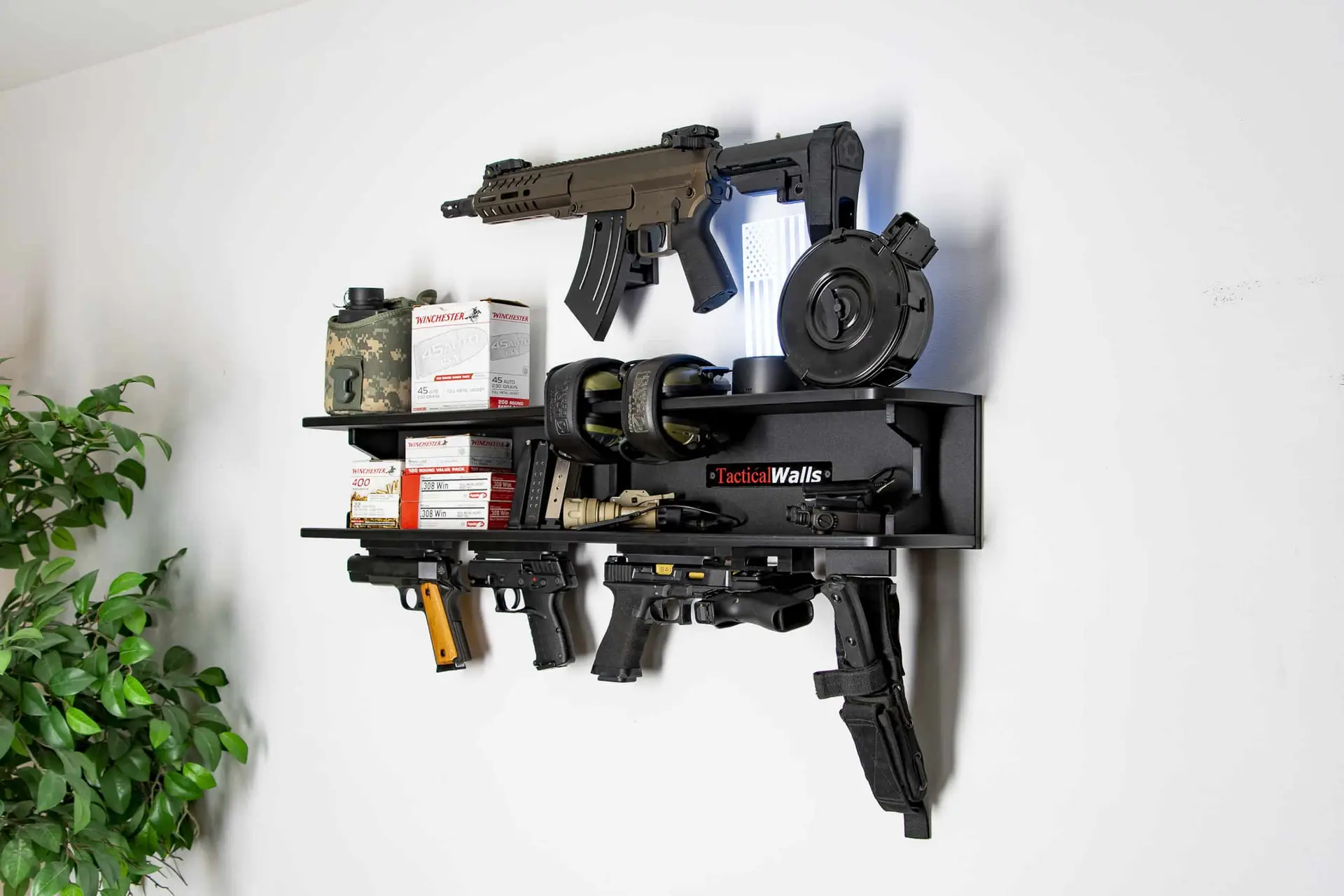 ModWall Dual Shelf Package Dual shelf gun storage mounted on a wall showing mounted accessories and hangers.