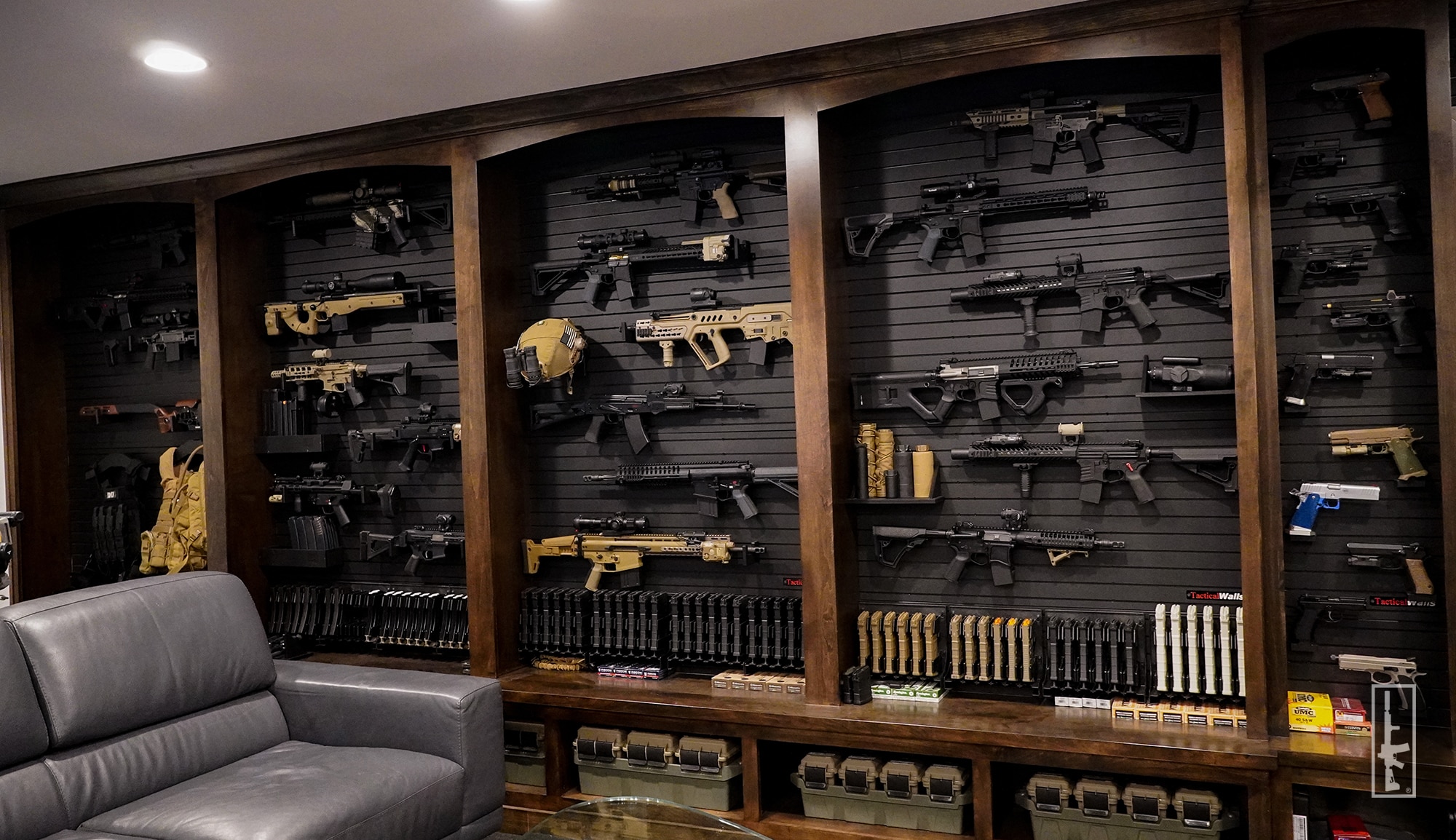 Modwall customer install with rifles, pistols, and gear