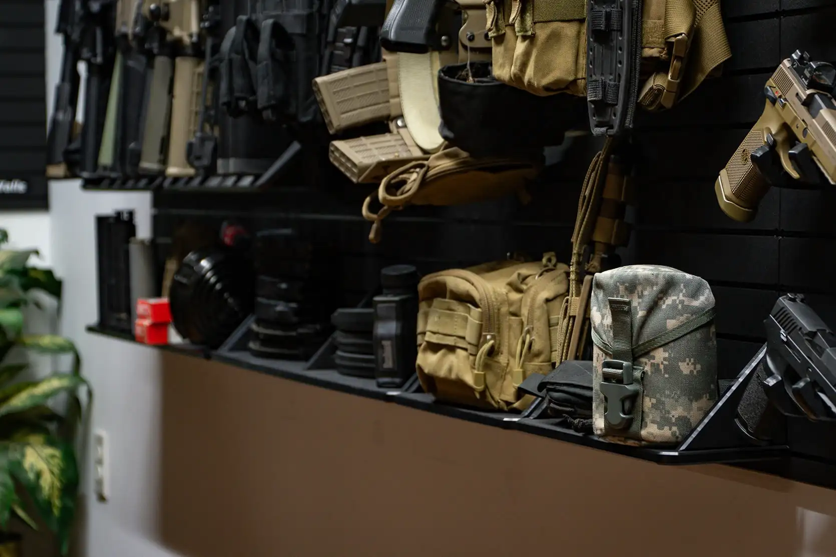 Yellowstone Marshals Arsenal Package Flat tactical accessory shelves with ammo boxes and gear on the ModWall Yellowstone Marshals Arsenal Package.
