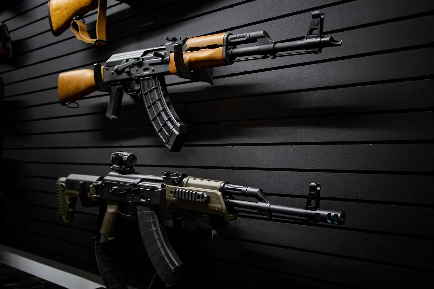 Modern tactical and classic style semiautomatic long guns displayed horizontally using Modwall Horizontal Gun Racks.